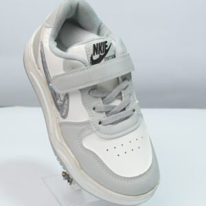 white and grey nike sneaker