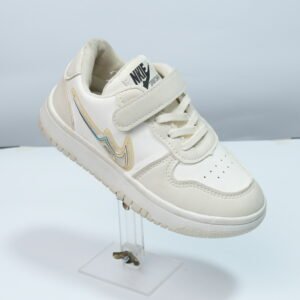 white and cream nike sneaker